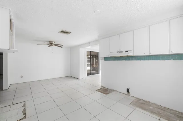 a view of a garage with white walls