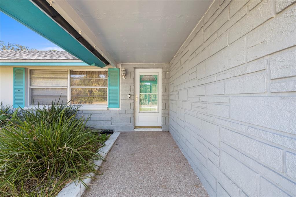 7840 Gulf Way Hudson, FL 34667 - Photo 29 of 44 a view of house with backyard