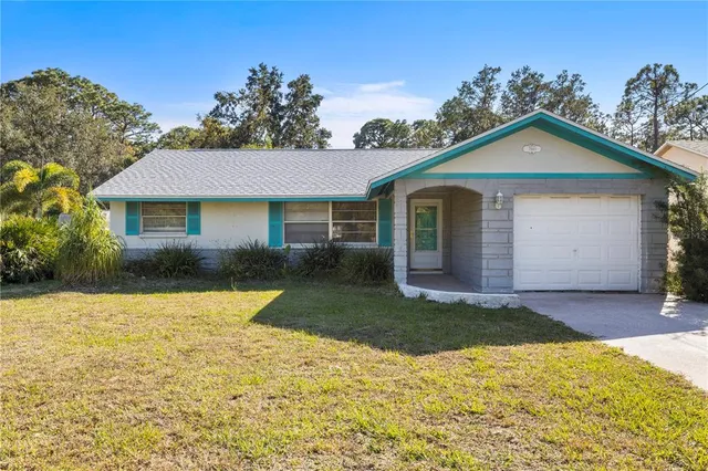 a view of an chairs and table in the patio