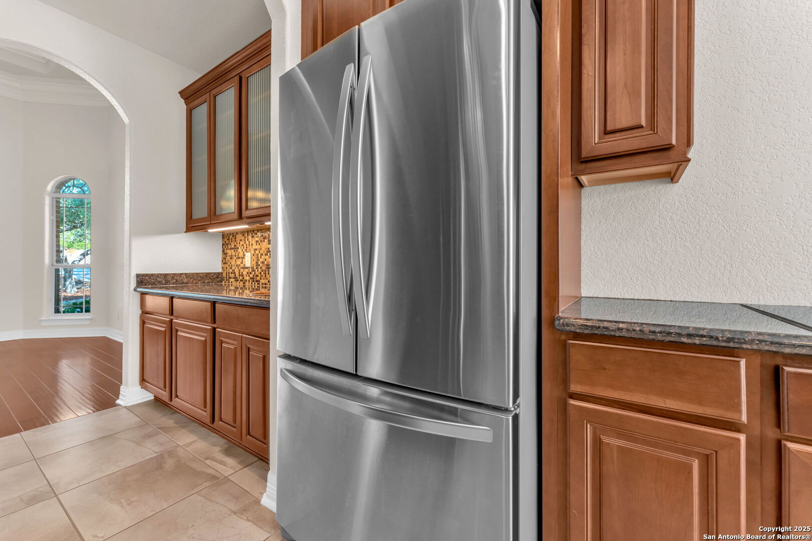 732 Private Road 1712 Mico, TX 78056 - Photo 16 of 50 a kitchen with a refrigerator and cabinets