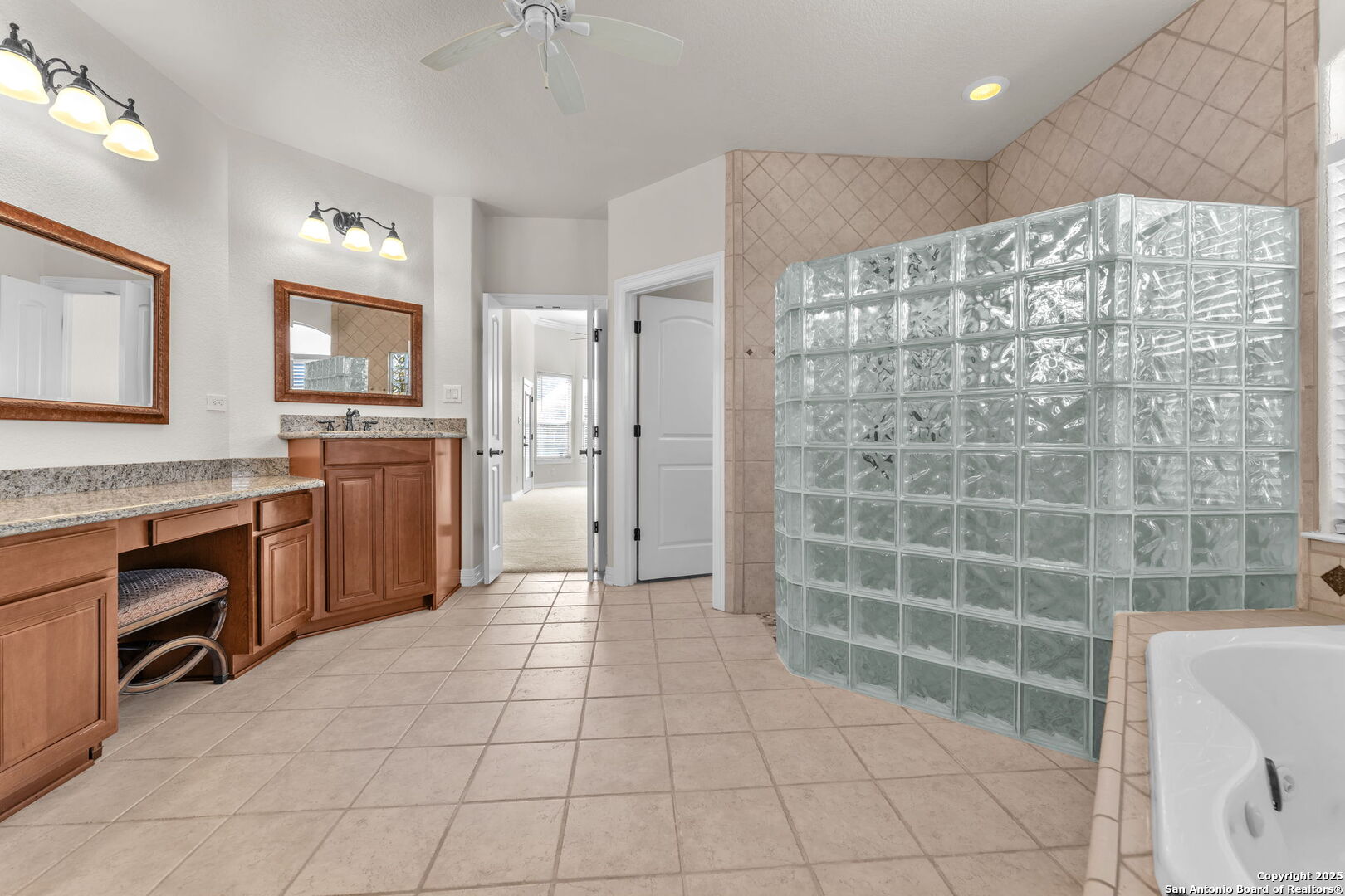 732 Private Road 1712 Mico, TX 78056 - Photo 29 of 50 a kitchen with granite countertop a stove a sink and a refrigerator