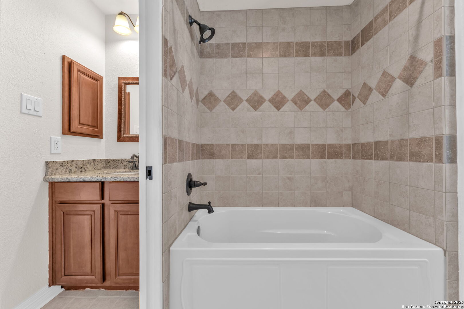 732 Private Road 1712 Mico, TX 78056 - Photo 34 of 50 a bathroom with a granite countertop bathtub shower and sink