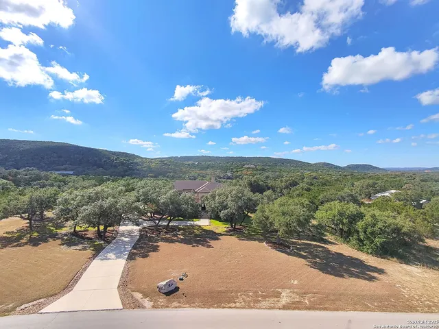a view of a lake from a balcony