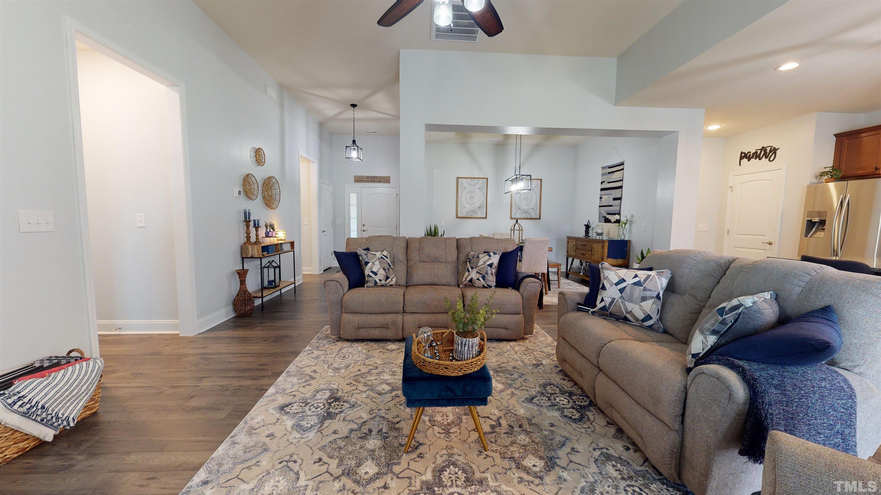 96 Longo Lane Benson, NC 27504 - Photo 12 of 51 a living room with furniture and wooden floor