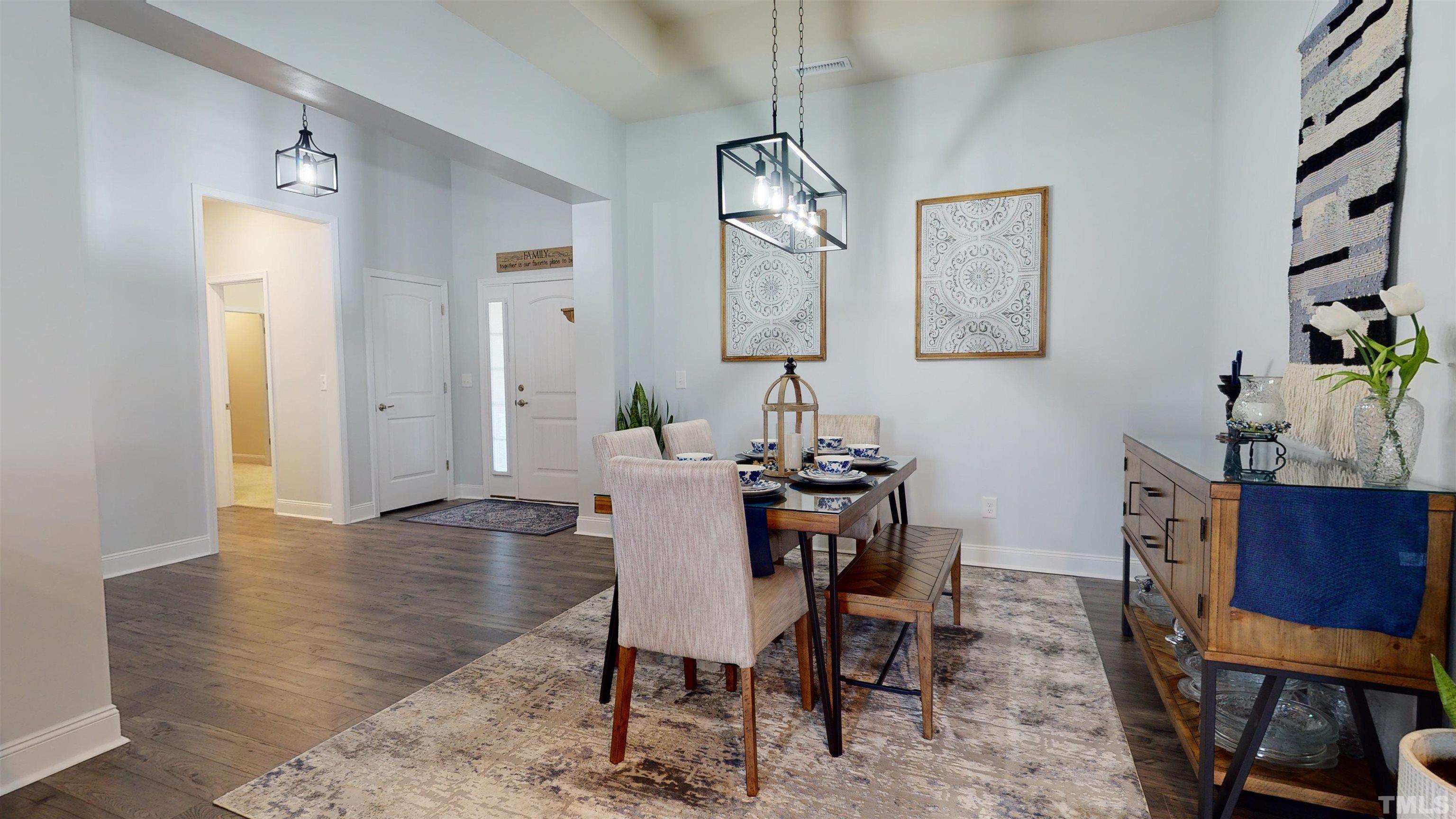 96 Longo Lane Benson, NC 27504 - Photo 15 of 51 a view of a dining room with furniture