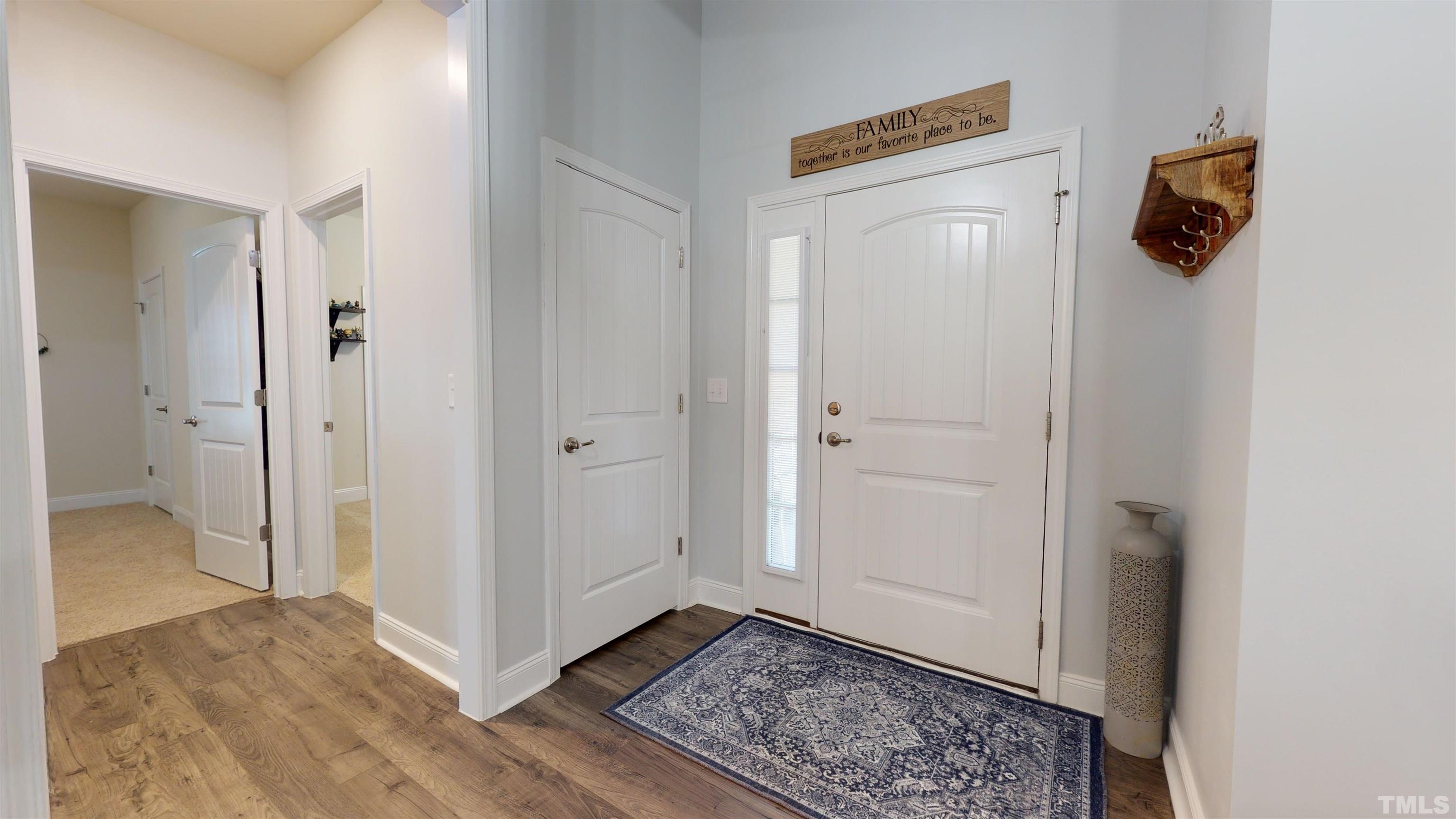 96 Longo Lane Benson, NC 27504 - Photo 21 of 51 a view of an entryway with wooden floor