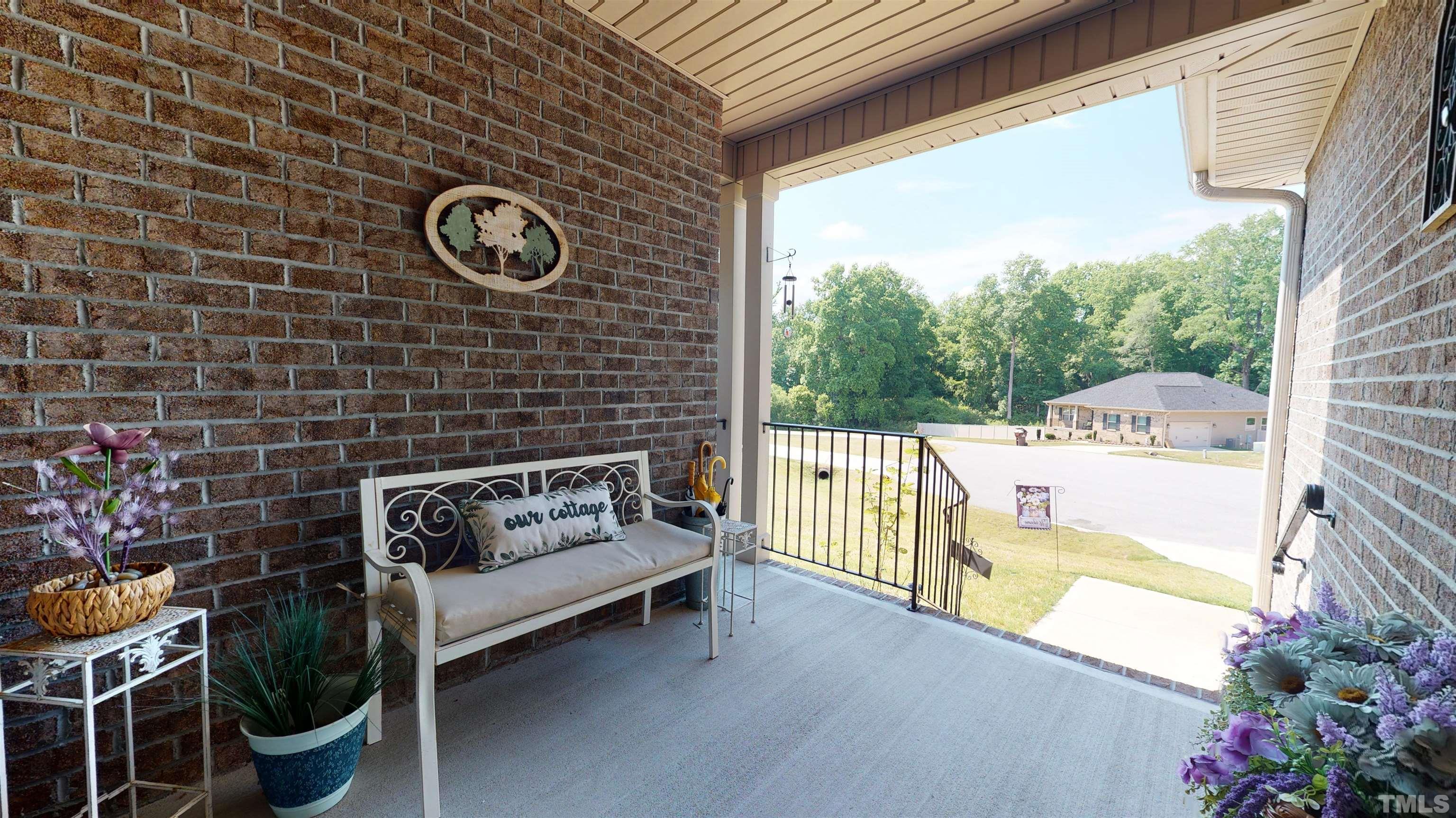 96 Longo Lane Benson, NC 27504 - Photo 3 of 51 a view of a bench in balcony