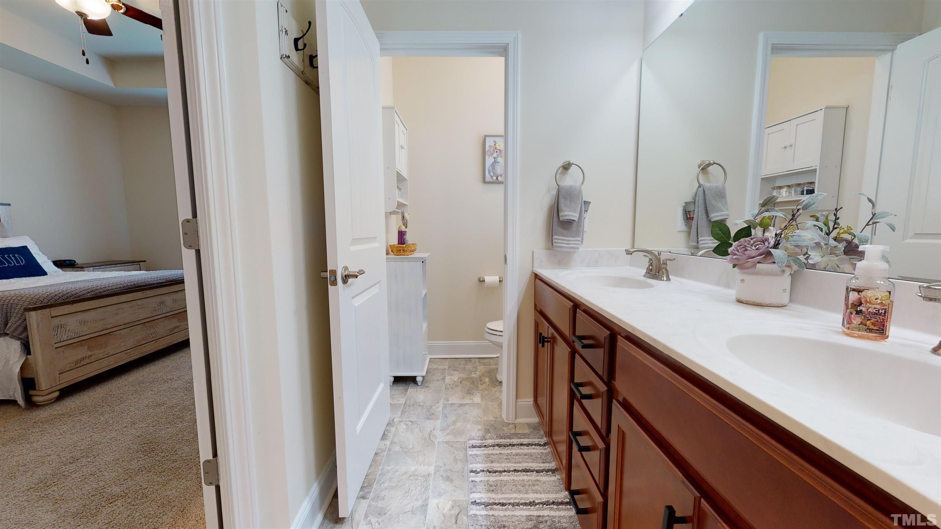 96 Longo Lane Benson, NC 27504 - Photo 31 of 51 a bathroom with a sink and a mirror