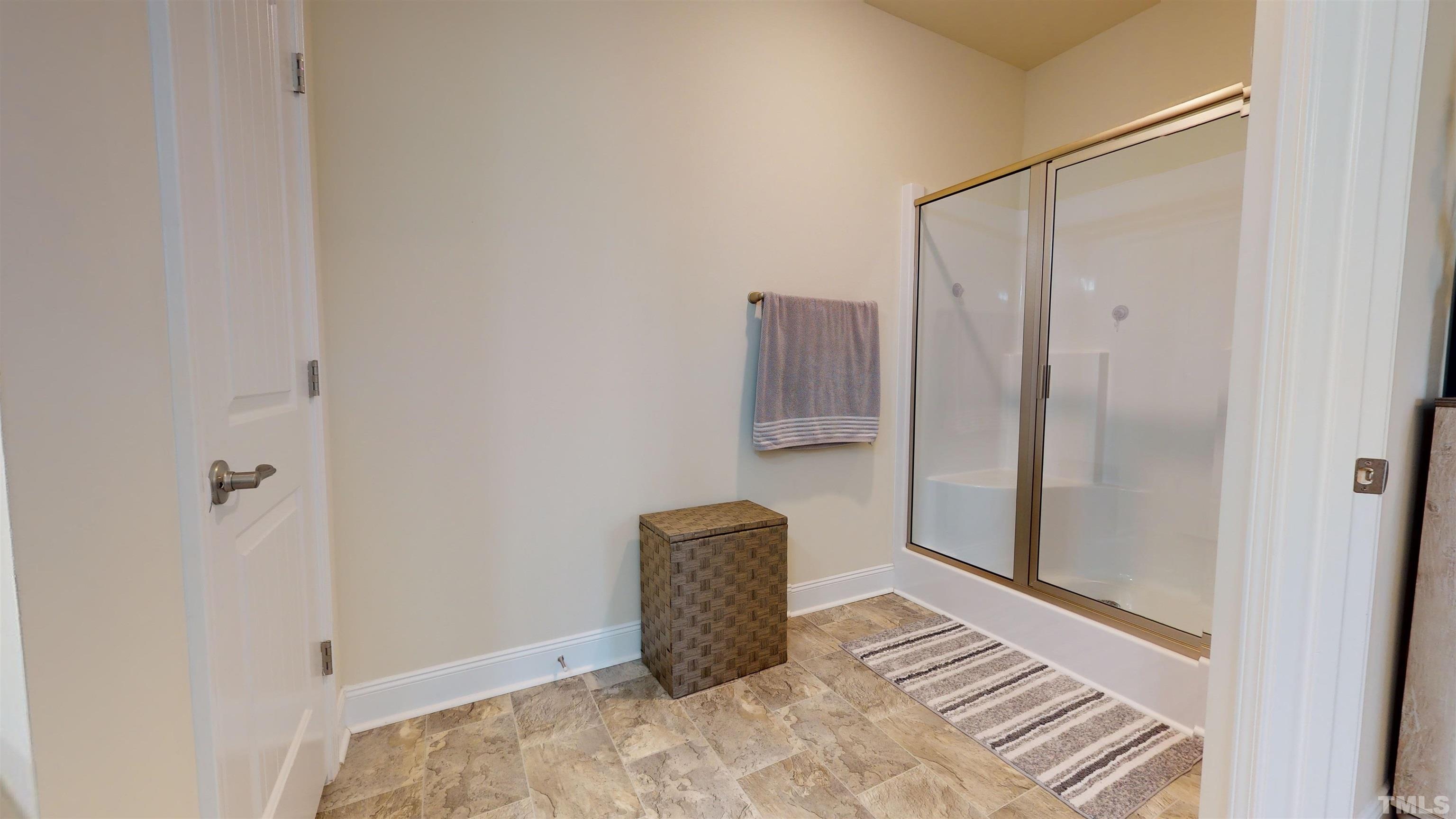 96 Longo Lane Benson, NC 27504 - Photo 36 of 51 a view of a hallway with wooden floor and a cabinet