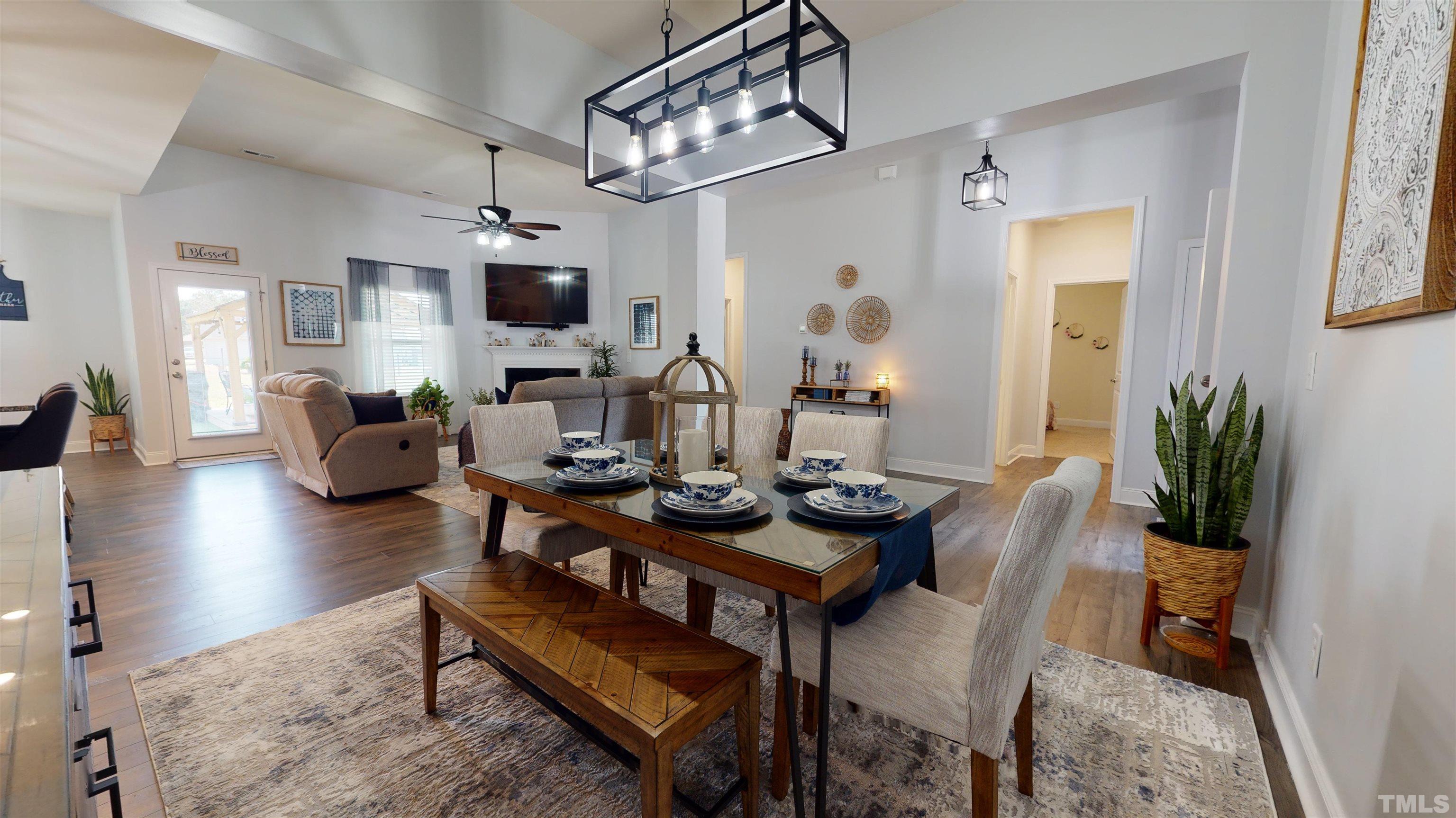 96 Longo Lane Benson, NC 27504 - Photo 6 of 51 a living room with furniture and a chandelier