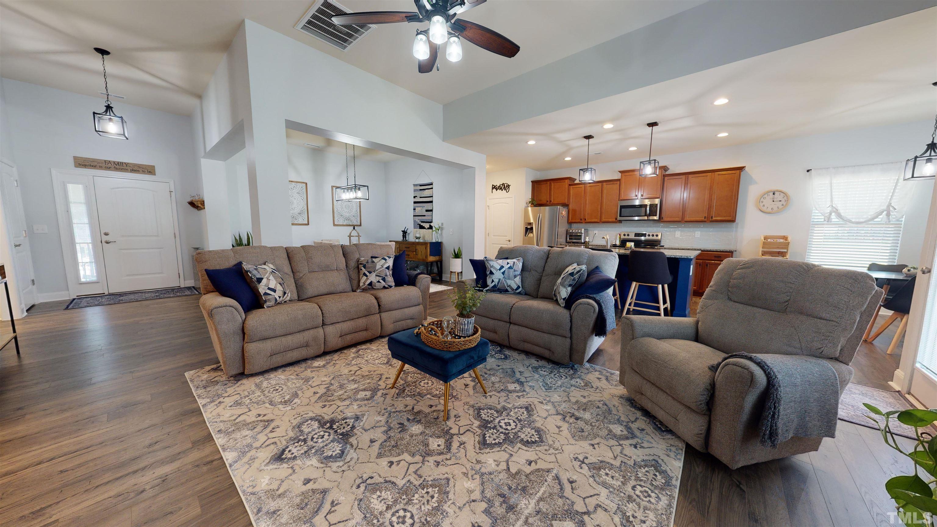 96 Longo Lane Benson, NC 27504 - Photo 10 of 51 a living room with furniture and a wooden floor