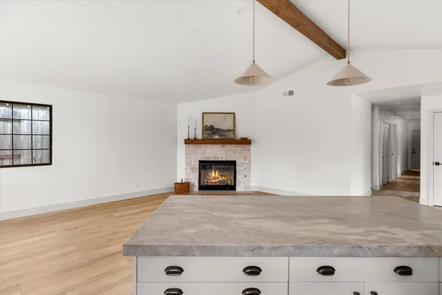 a living room with a fireplace