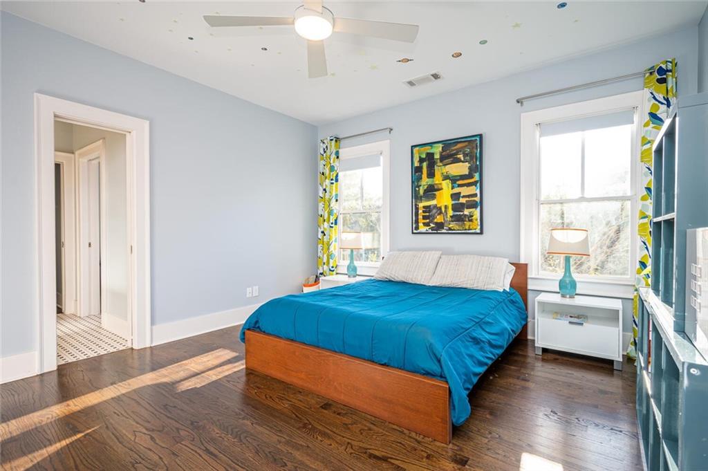 123 Ansley Street Decatur, GA 30030 - Photo 40 of 61 a bedroom with a bed and a window