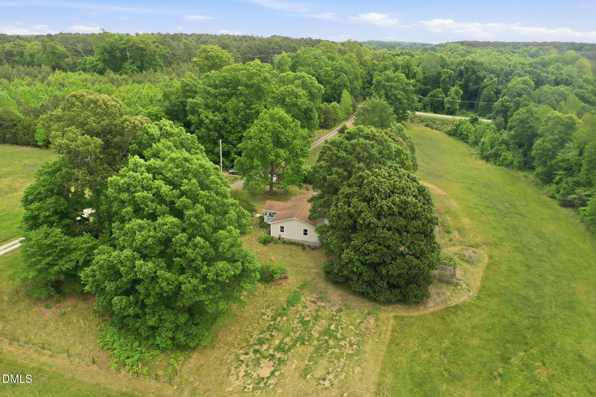 3200 Mill Creek Road Efland, NC 27243 - Photo 4 of 44 a view of a garden with a lake