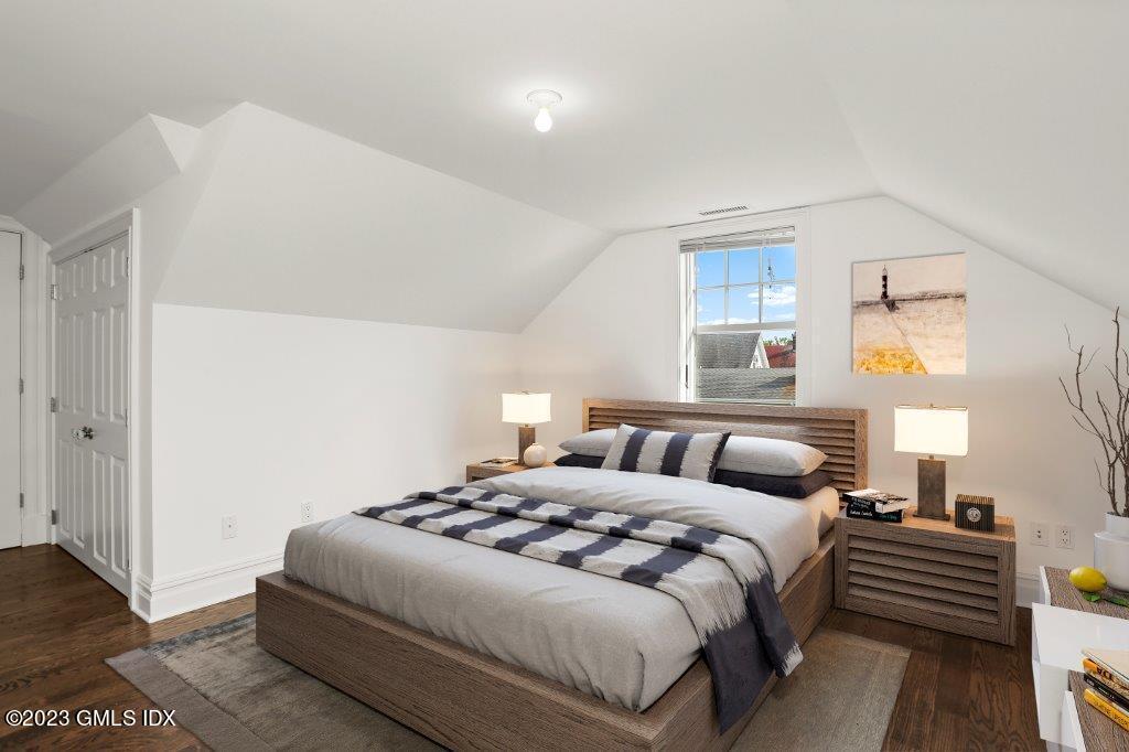 24 Orchard Place, Unit A Greenwich, CT 06830 - Photo 13 of 15 a bedroom with double bed and a night stand