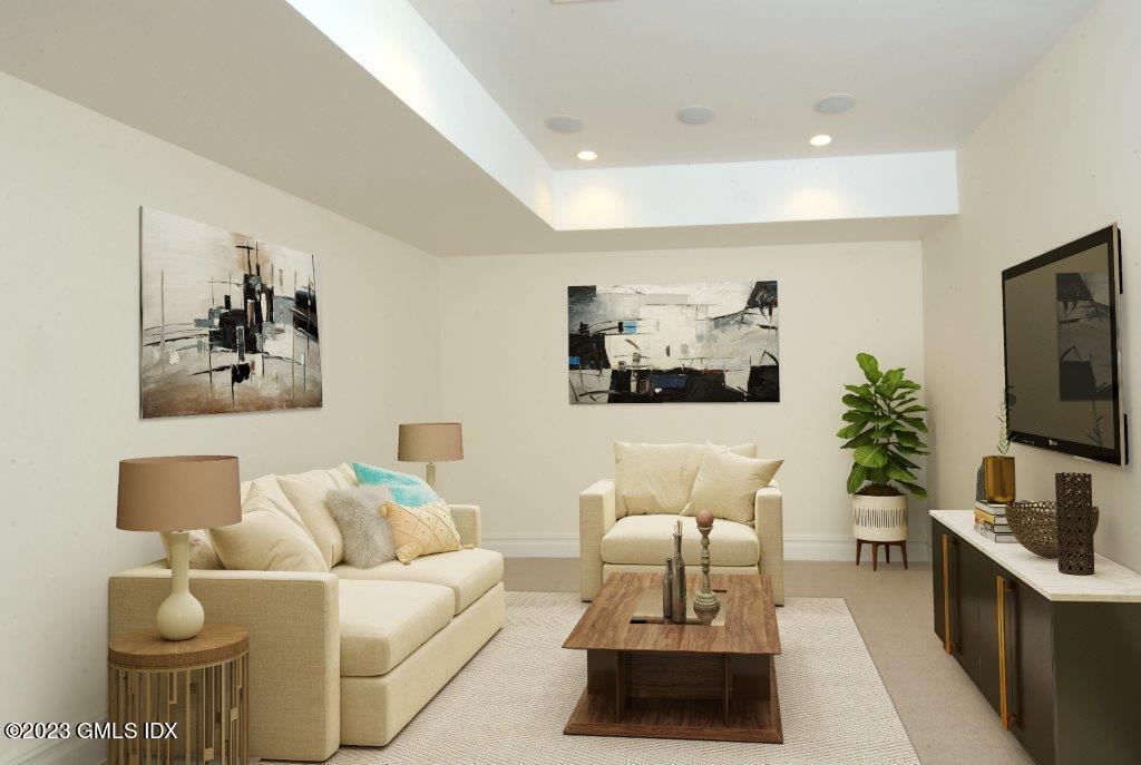 24 Orchard Place, Unit A Greenwich, CT 06830 - Photo 14 of 15 a living room with furniture and a flat screen tv
