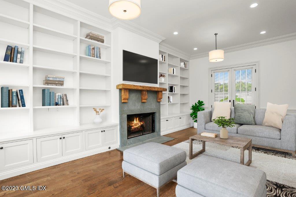 24 Orchard Place, Unit A Greenwich, CT 06830 - Photo 4 of 15 a living room with furniture fireplace and flat screen tv