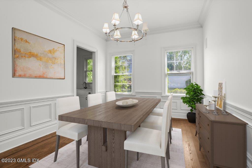 24 Orchard Place, Unit A Greenwich, CT 06830 - Photo 5 of 15 a view of a dining room with furniture window and wooden floor
