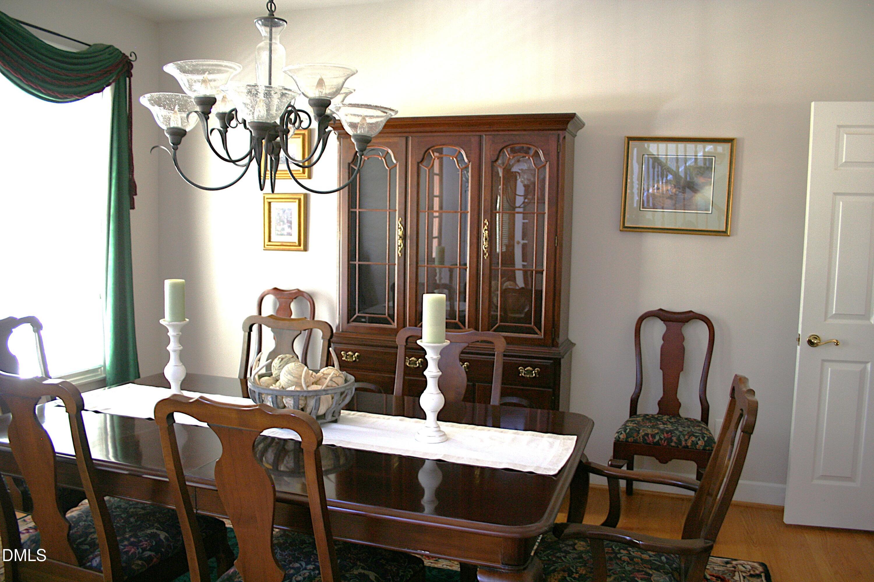 220 Jordan Narron Road Selma, NC 27576 - Photo 18 of 87 a view of a dining room with furniture window and wooden floor