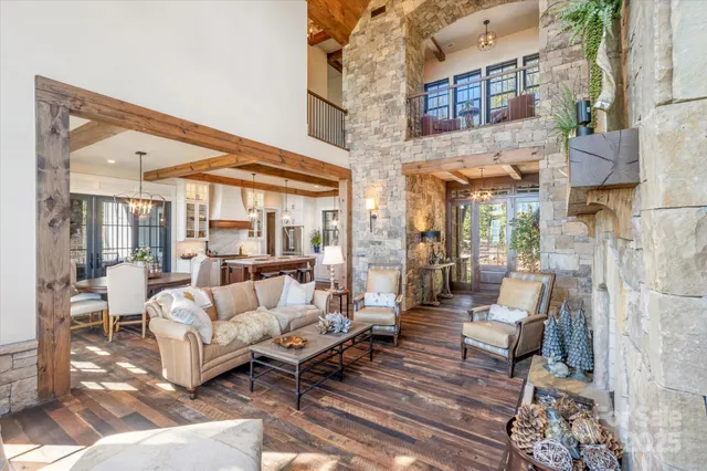 a spacious bedroom with a bed and a large window