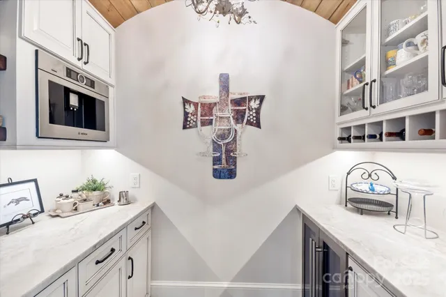a white bath tub sitting next to a tub