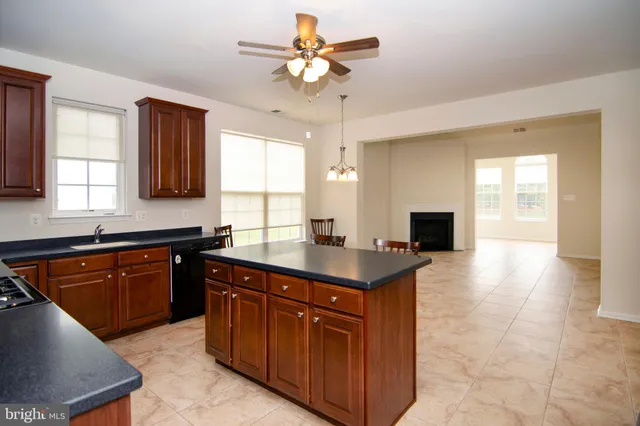 a view of a livingroom with furniture and wooden floor