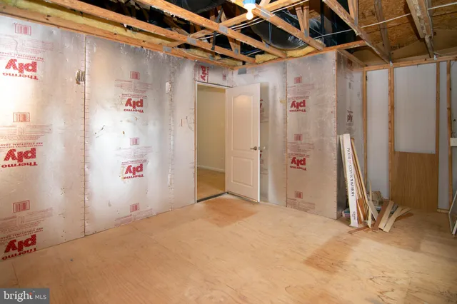 a view of a room with rack and cabinets