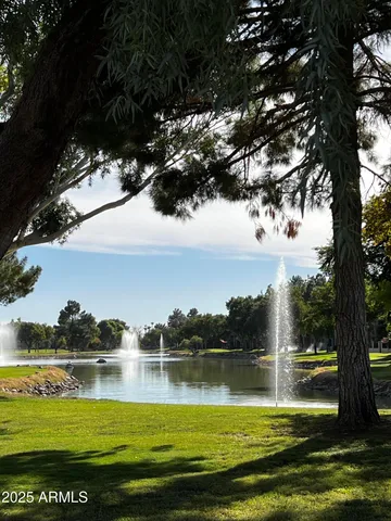 a kitchen with a sink stove and microwave