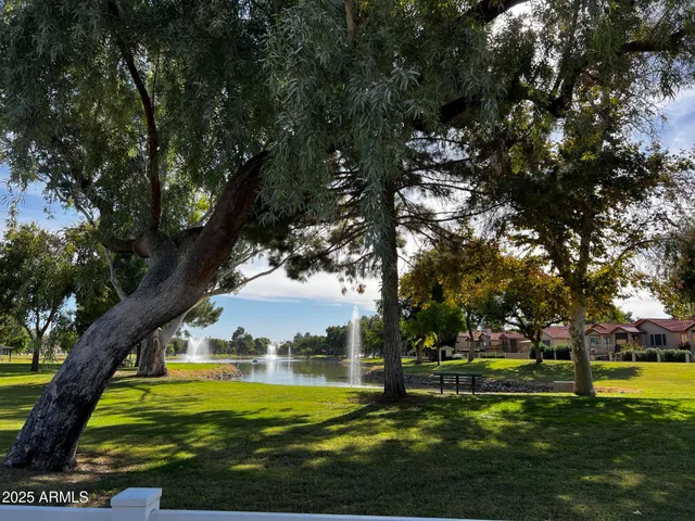 a kitchen with a sink and a refrigerator