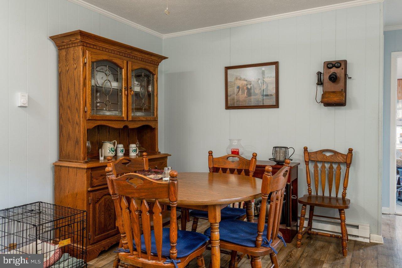 1204 Battle Creek Road Stanley, VA 22851 - Photo 17 of 46 a view of a dining room with furniture