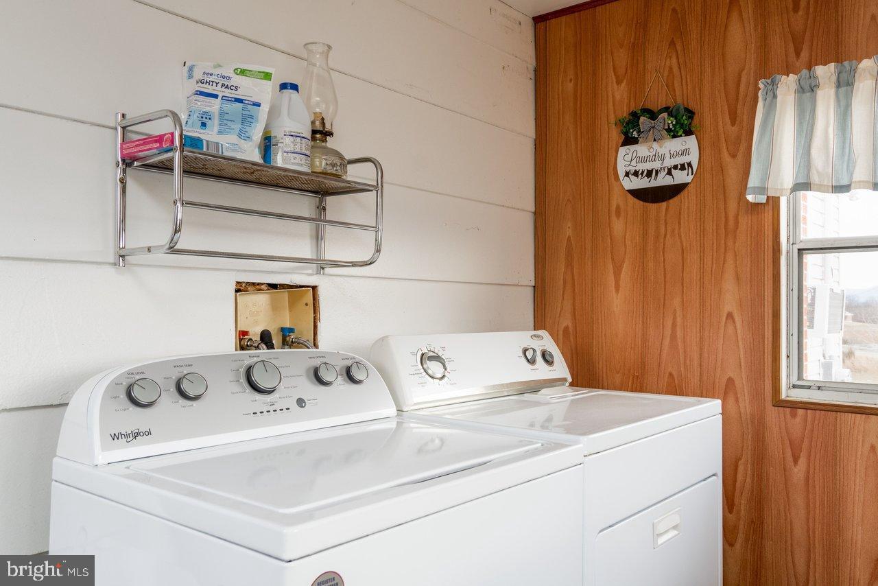 1204 Battle Creek Road Stanley, VA 22851 - Photo 30 of 46 a utility room with dryer and washer