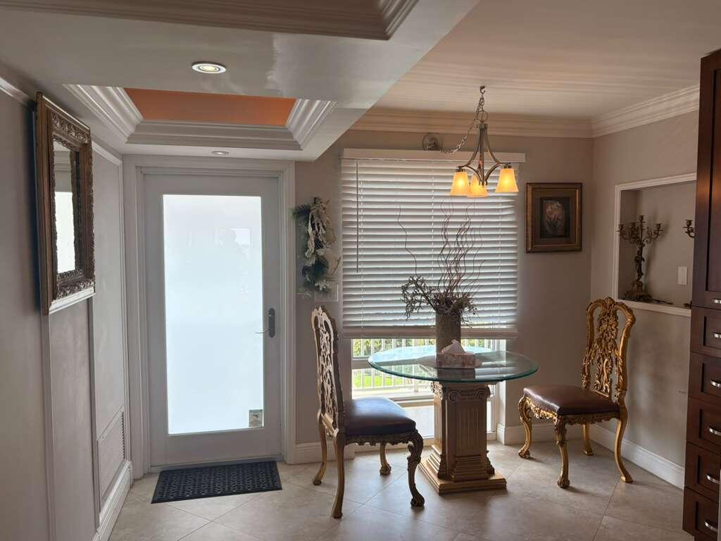 2611 North Riverside Drive, Unit 703 Pompano Beach, FL 33062 - Photo 14 of 81 a view of a livingroom with furniture and a window