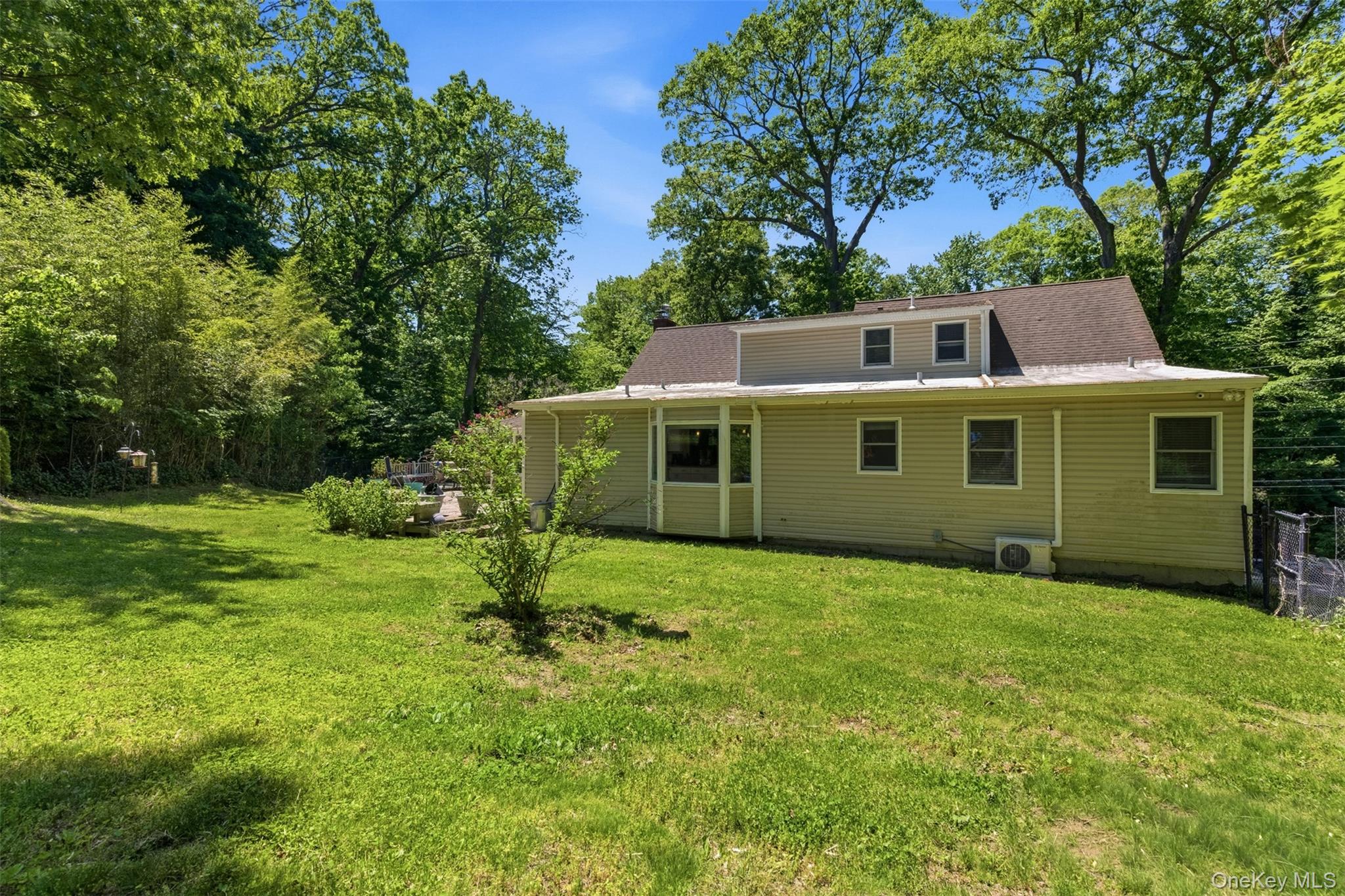 106 Vineyard Road Huntington, NY 11743 - Photo 25 of 25 a front view of a house with a yard