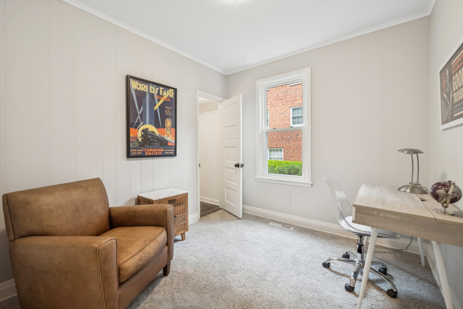 2429 Central Street Evanston, IL 60201 - Photo 16 of 34 a living room with furniture and a window