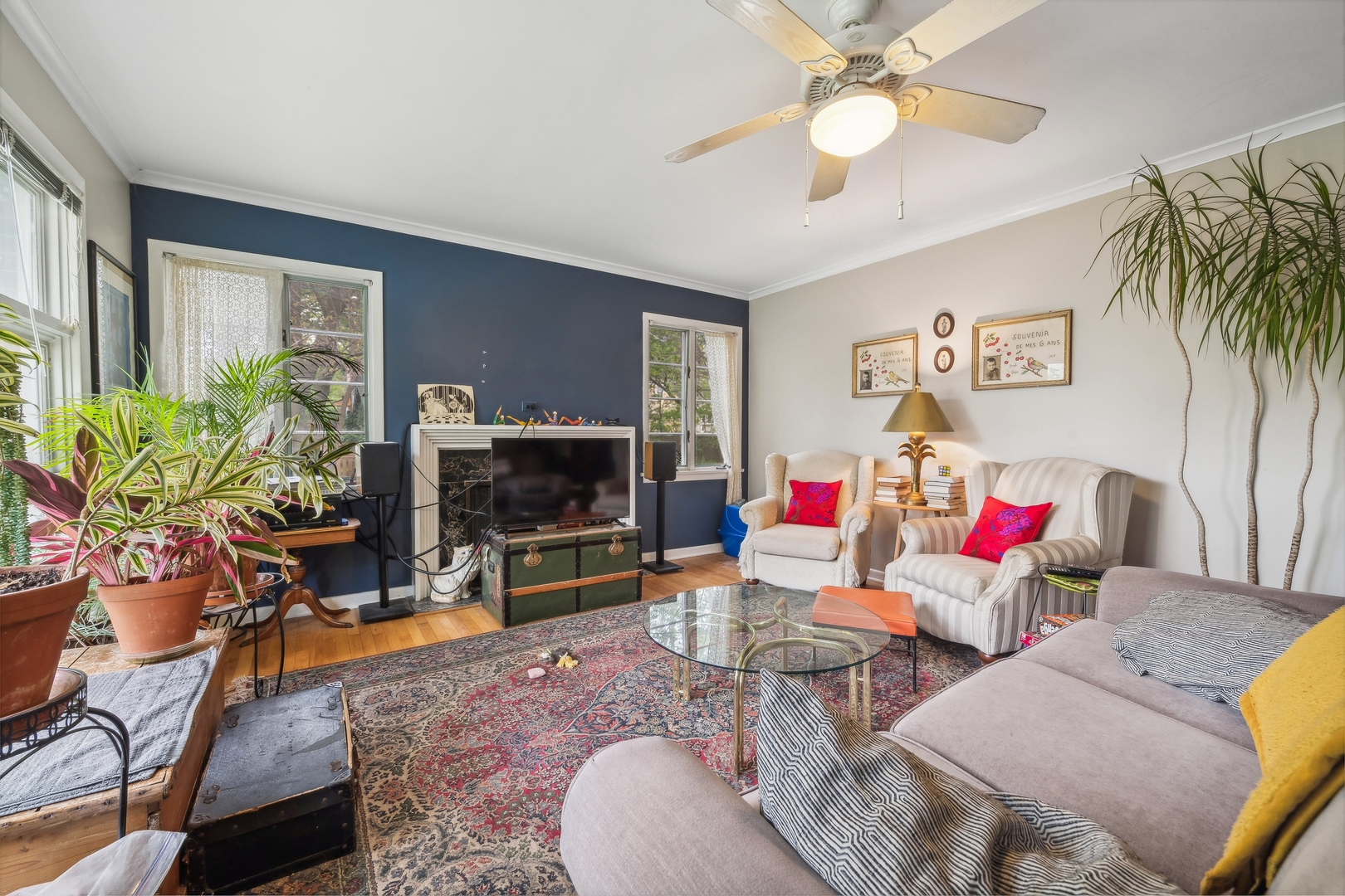2429 Central Street Evanston, IL 60201 - Photo 28 of 34 a living room with furniture and a flat screen tv