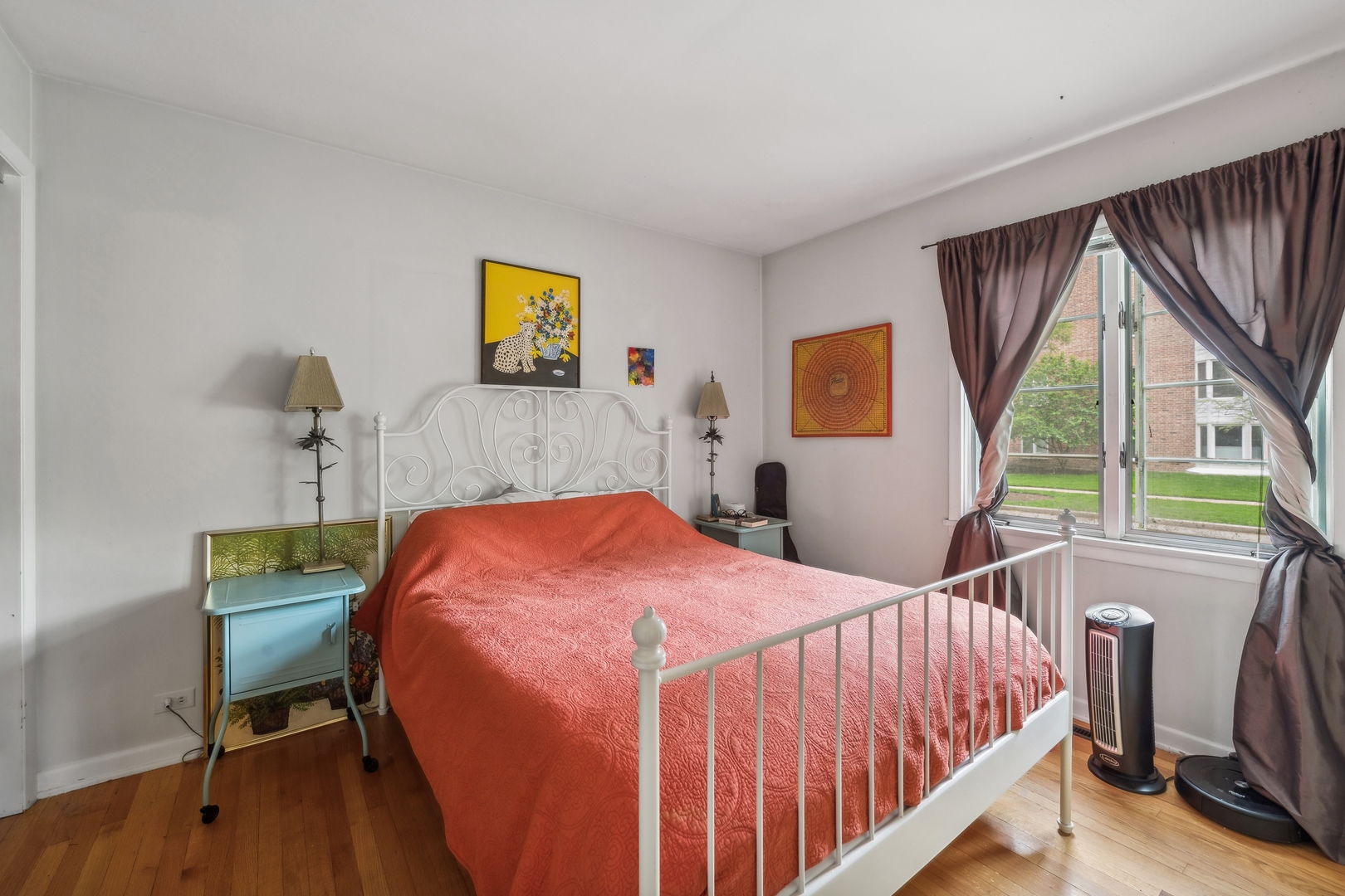 2429 Central Street Evanston, IL 60201 - Photo 30 of 34 a bedroom with a bed a chair and a large window