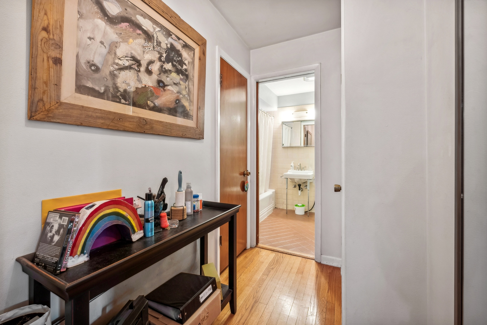 2429 Central Street Evanston, IL 60201 - Photo 31 of 34 a view of a hallway to a livingroom with furniture