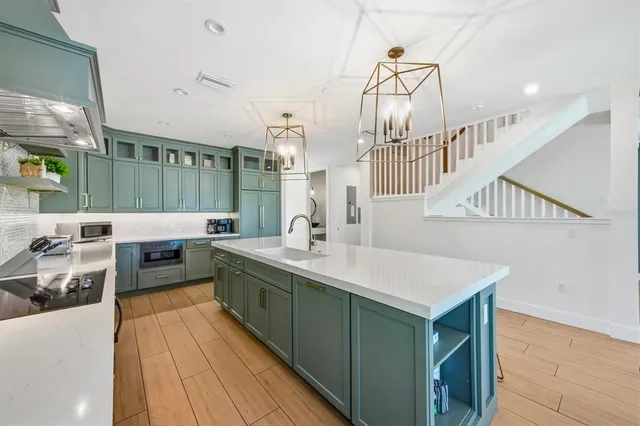 a bathroom with a double vanity sink and mirror
