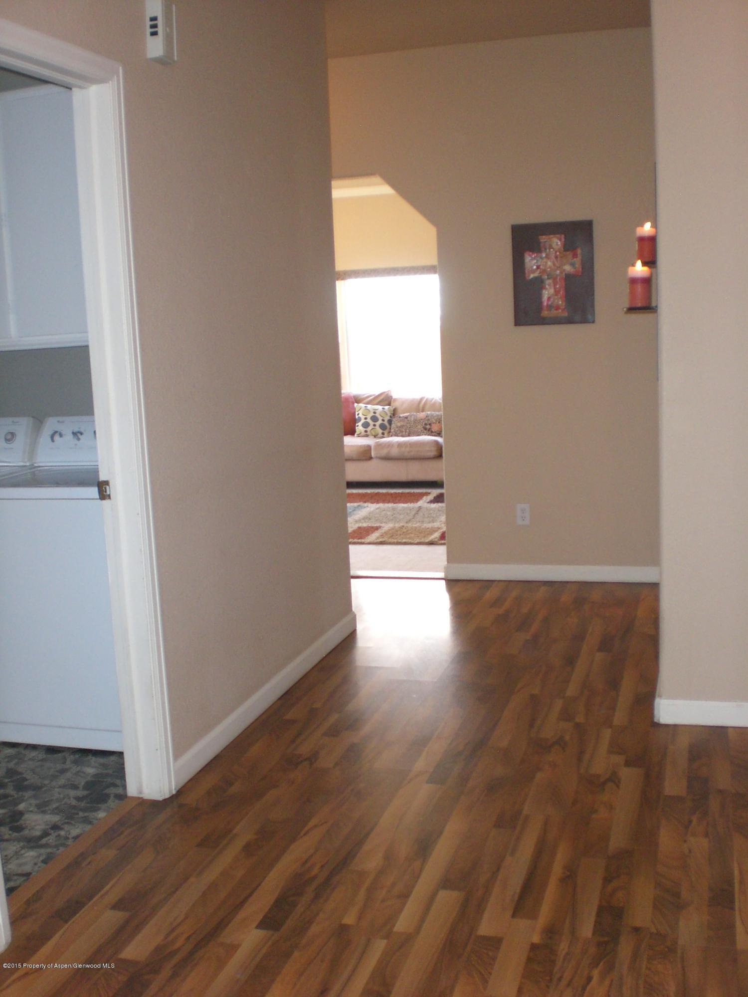 1530 East 12th Street Rifle, CO 81650 - Photo 12 of 27 laminate wood floors.JPG