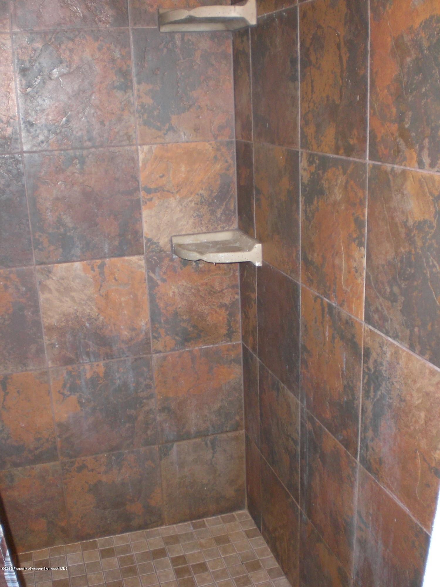 1530 East 12th Street Rifle, CO 81650 - Photo 19 of 27 master tiled shower.JPG