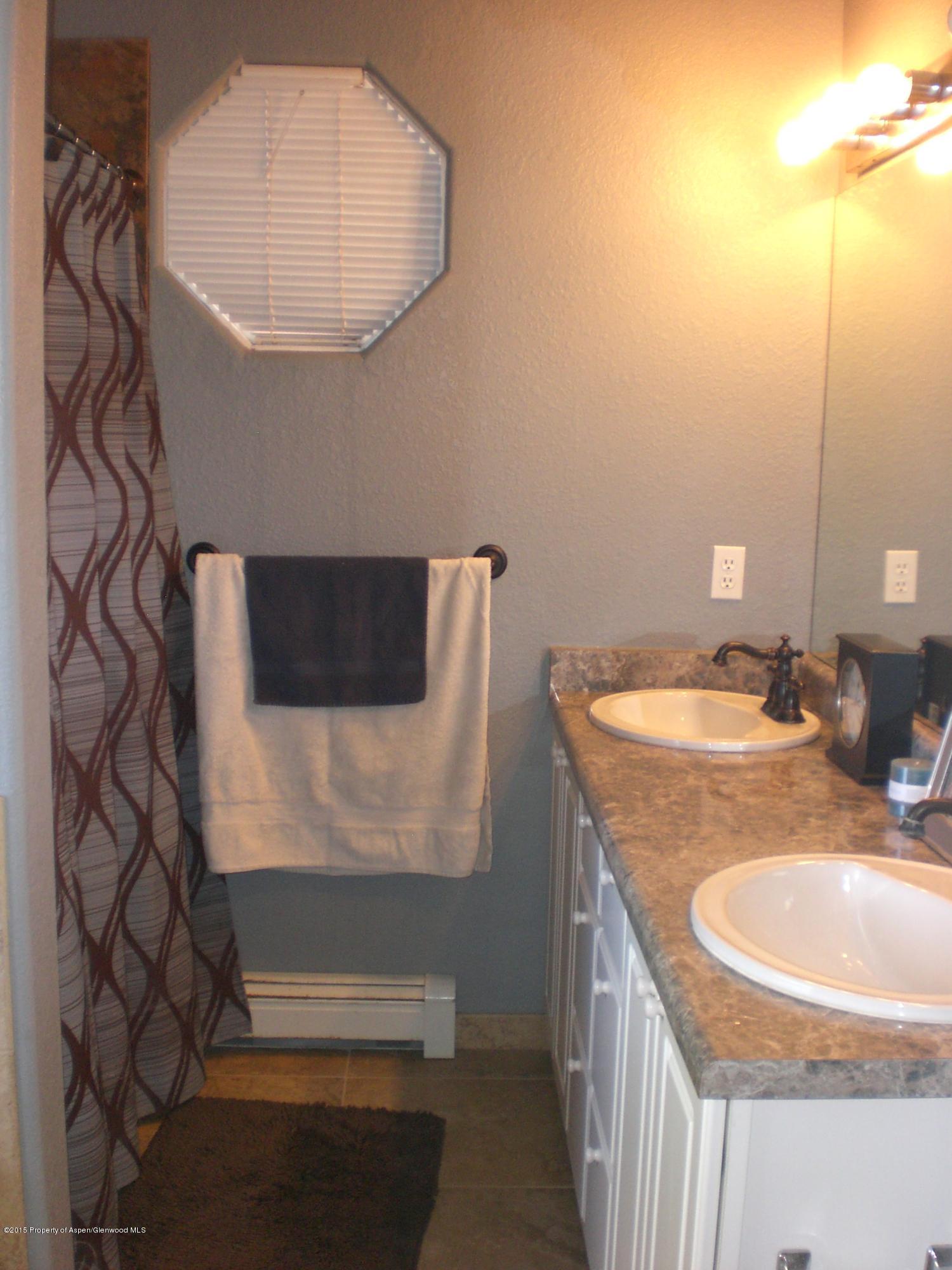 1530 East 12th Street Rifle, CO 81650 - Photo 21 of 27 sinks and walk in shower.JPG