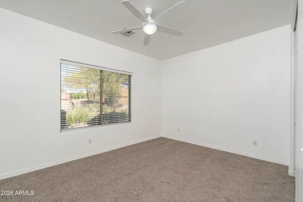 a view of a livingroom with a large window