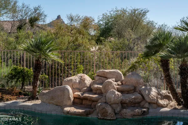 a view of a backyard with a garden