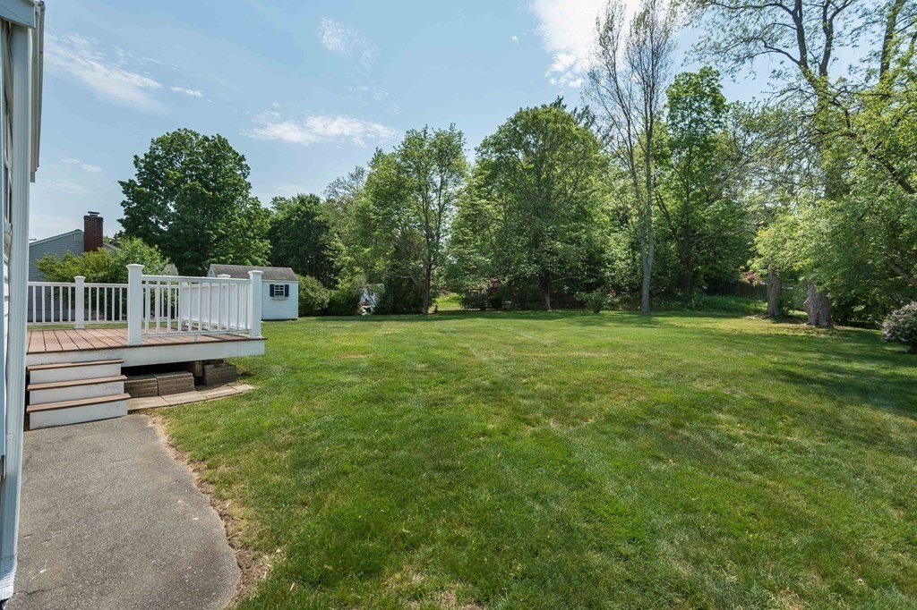 18 Samoset Road Woburn, MA 01801 - Photo 19 of 22 a view of a garden with wooden fence