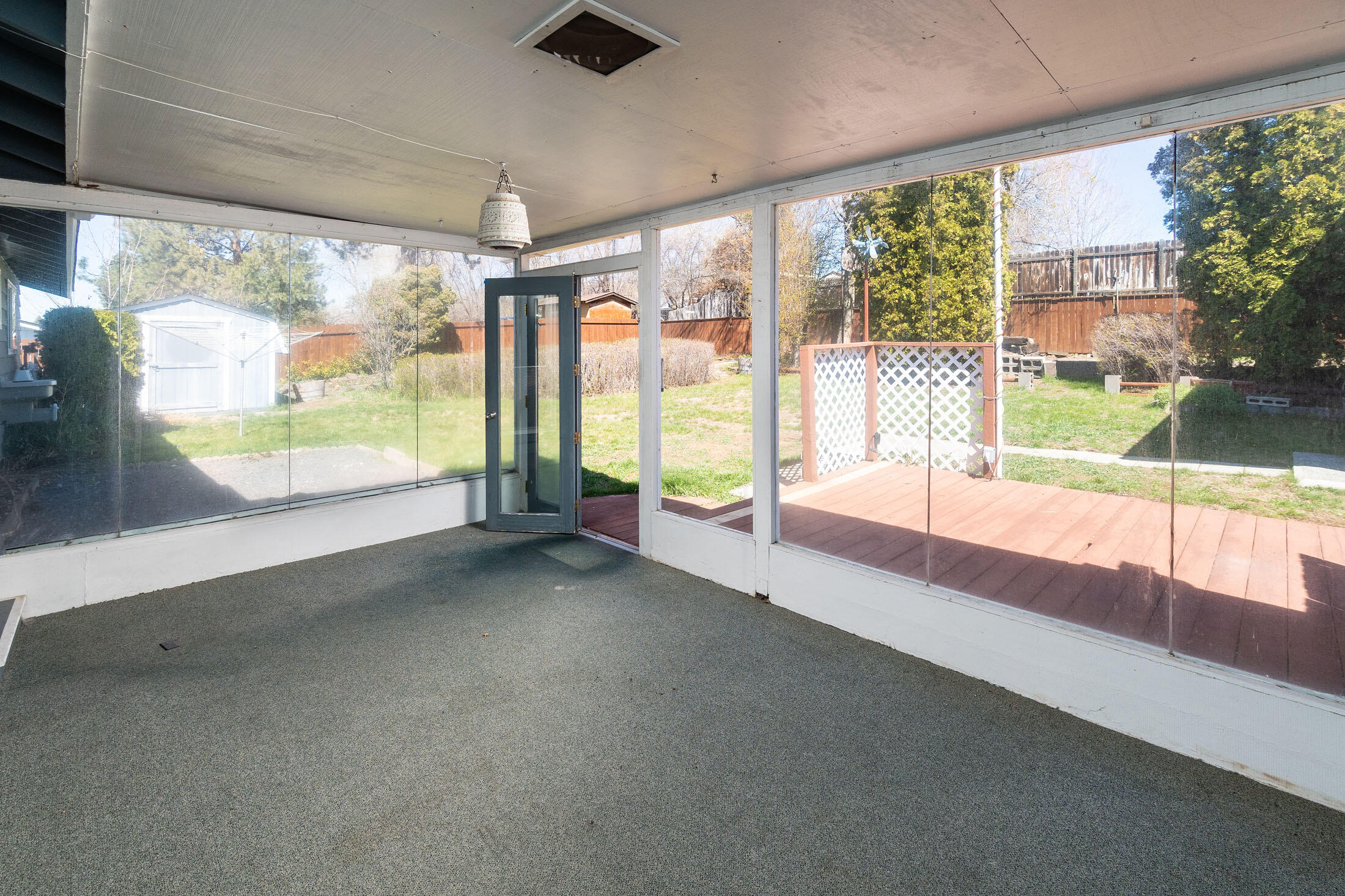 2188 Northeast Shepard Road Bend, OR 97701 - Photo 26 of 52 The back patio is covered and enclosed. It's great for potted plants, security, and a sun-room feeling.