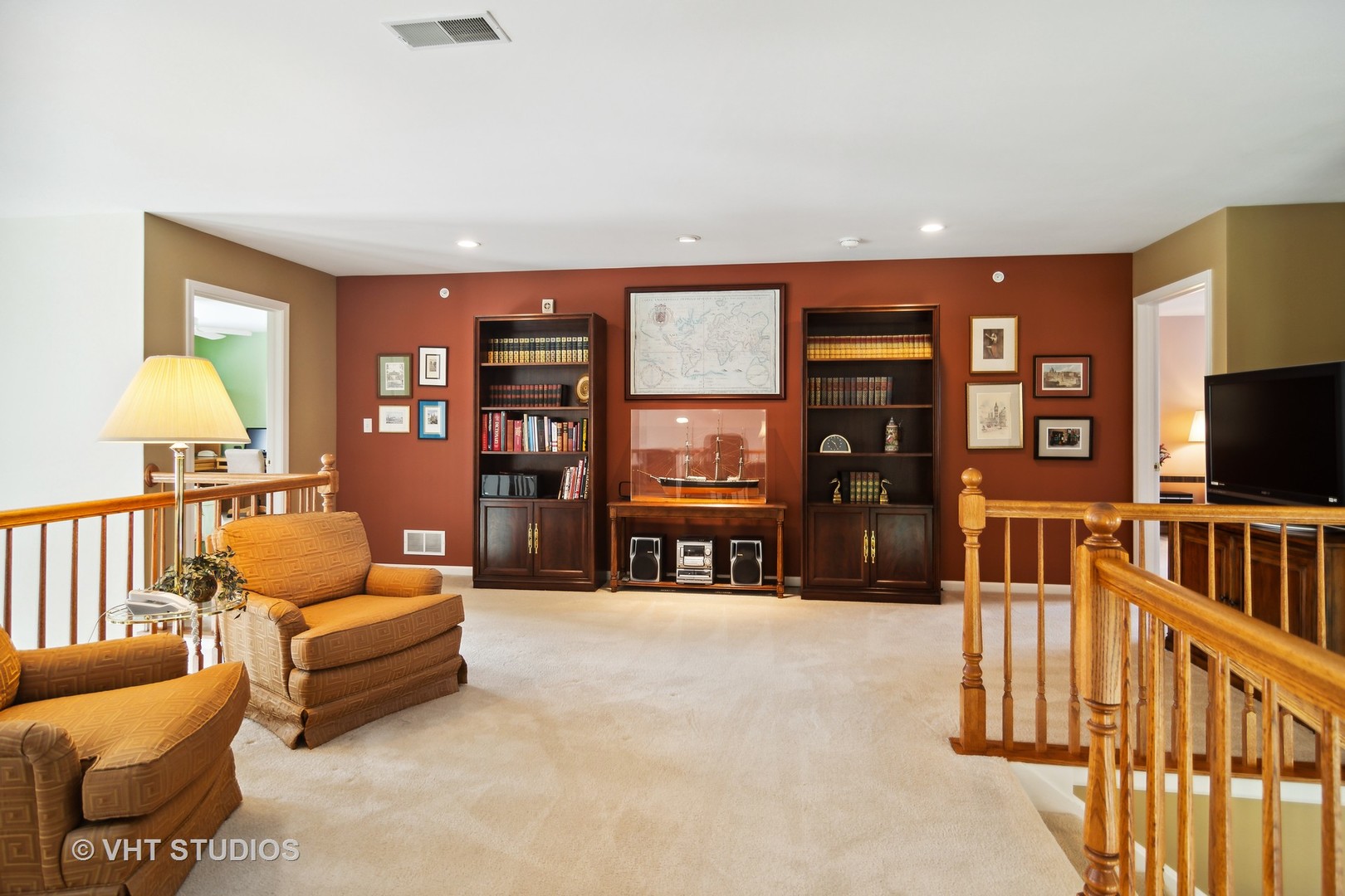 716 Fieldstone Court Inverness, IL 60010 - Photo 16 of 25 a living room with furniture and a flat screen tv