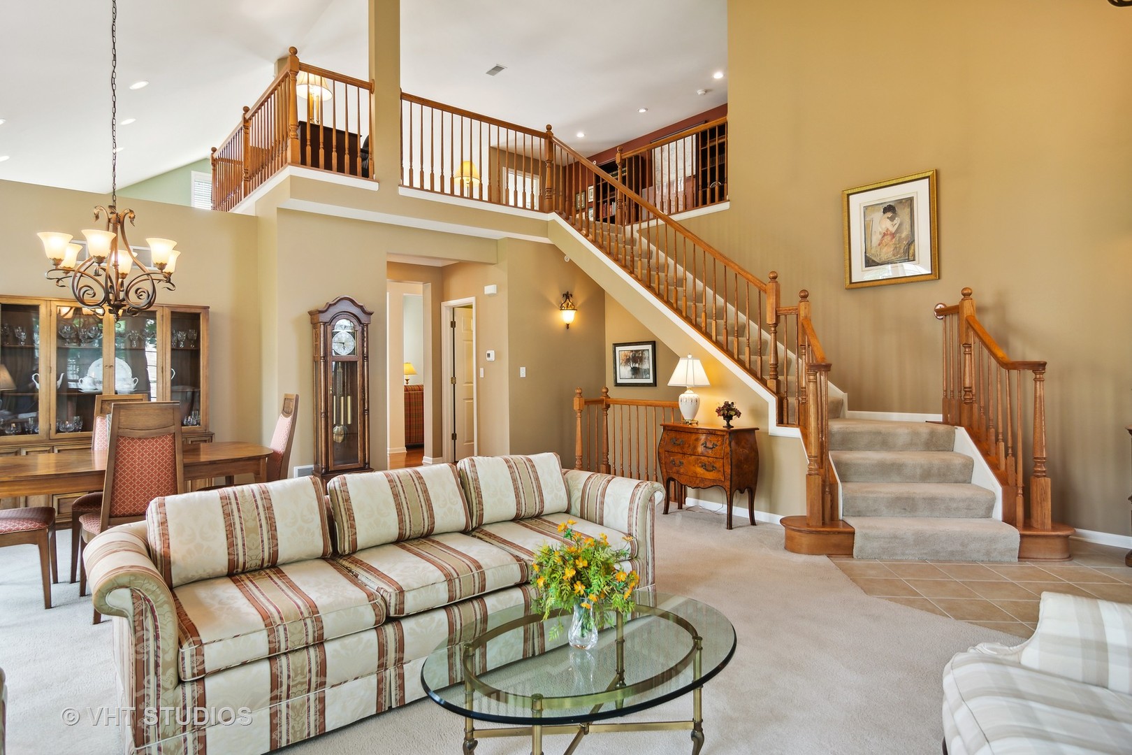 716 Fieldstone Court Inverness, IL 60010 - Photo 5 of 25 a living room with furniture chandelier and a dining room