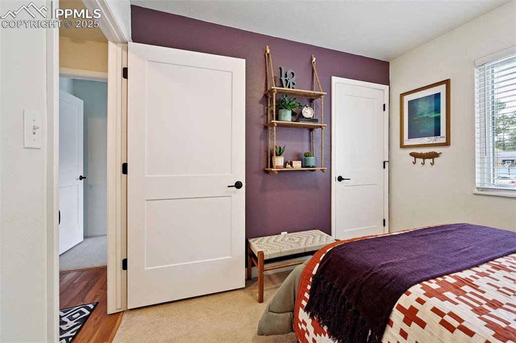 5139 Villa Circle Colorado Springs, CO 80918 - Photo 18 of 40 a bedroom with a bed and a closet