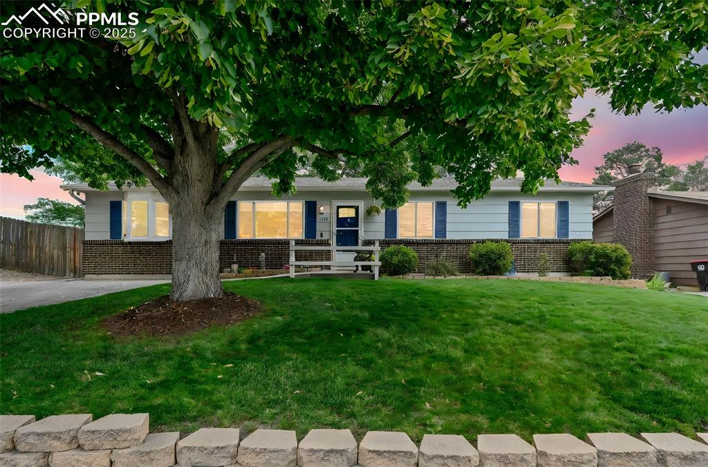 5139 Villa Circle Colorado Springs, CO 80918 - Photo 2 of 40 a house view with a garden space