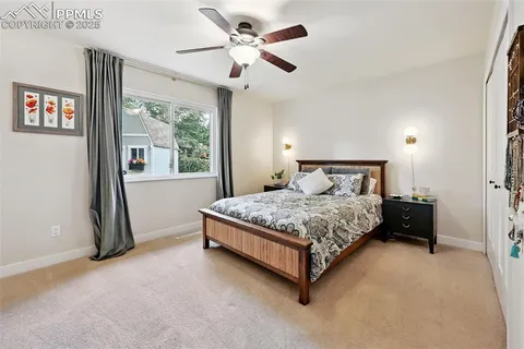 a bedroom with a bed and a walk in closet